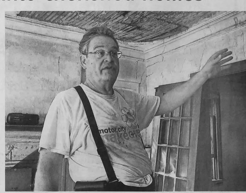 Pastor Grady Jensen inside a Detroit house being restored in 2016